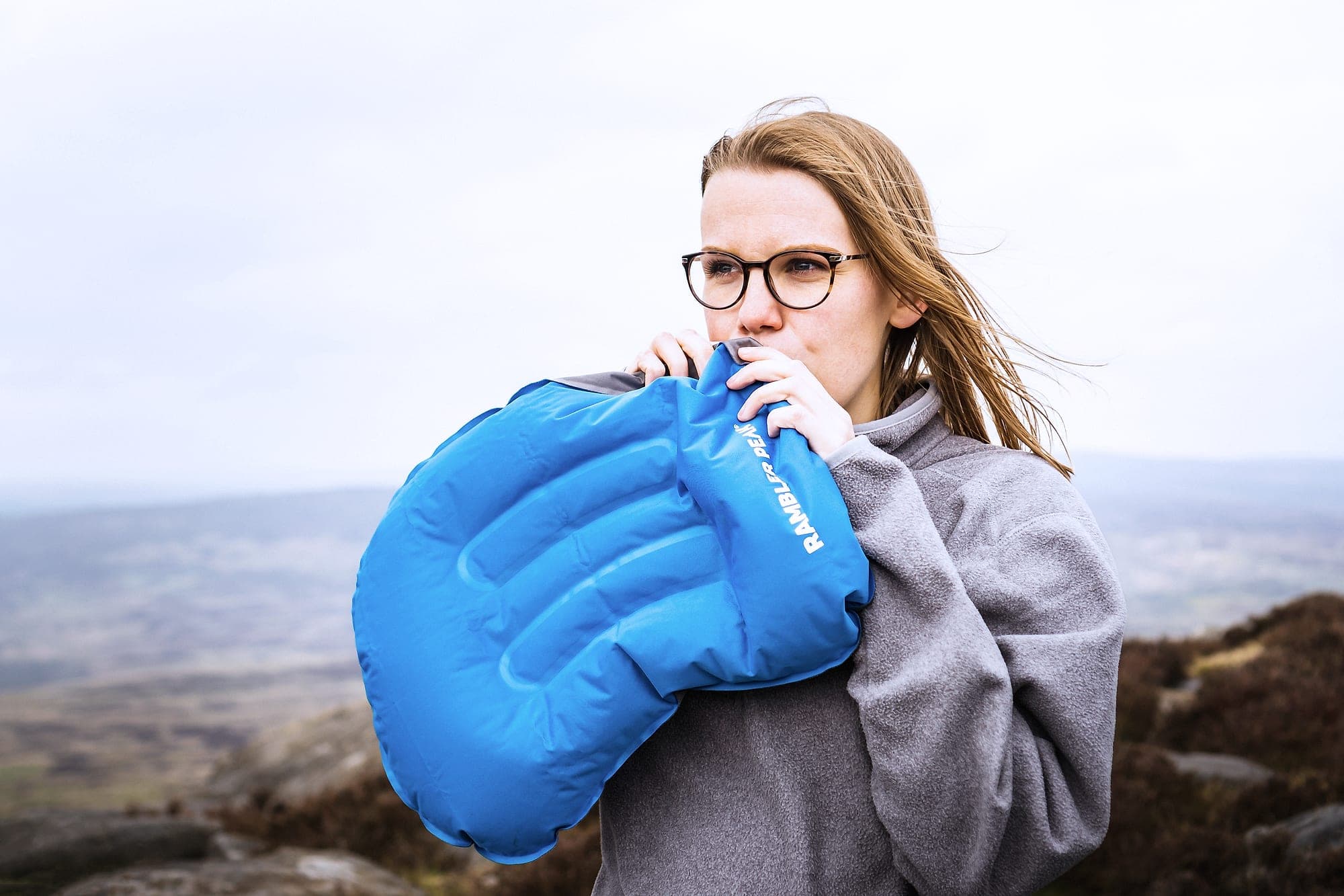 The Camping Pillow inflated in a single breath on a Peak District edge
